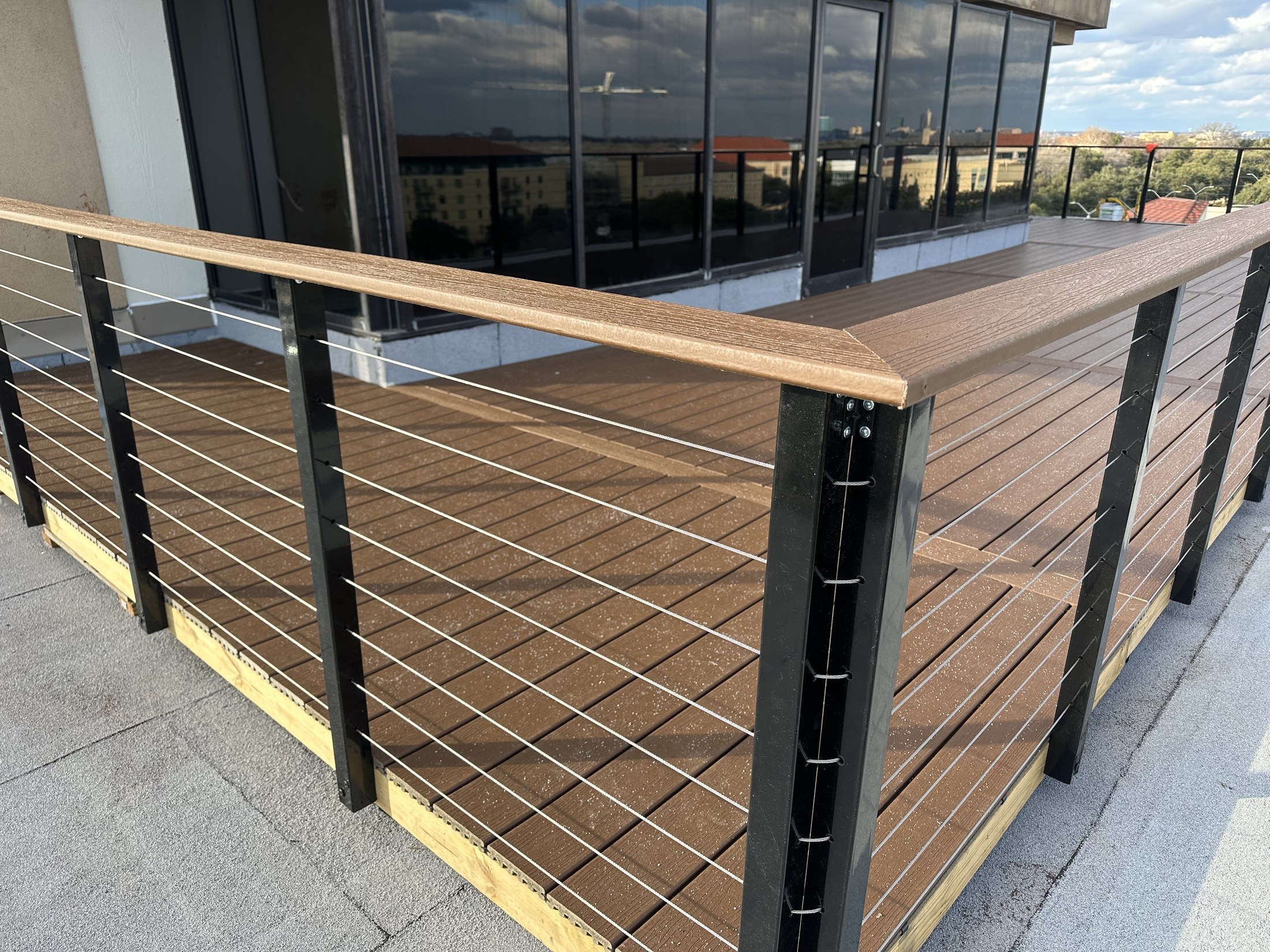 Finished commercial deck by Capatina Builders in Southlake